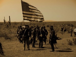 Union soldiers carry the American flag