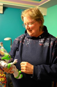 Former Persian Gulf air traffic controller Kellogg Patton with her Buzz Lightyear doll.