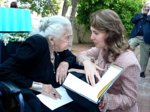 Congresswoman Gabrielle Giffords a year before the shooting, celebrating the 100th birthday of Tucson fashion legend Cele Peterson.