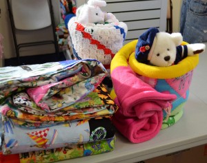 Blankets 4 Kids provides children from needy and often homeless families with warm blankets, as well as a stuffed toy and other treats.