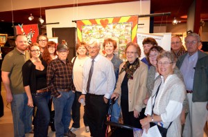 The Shortridge clan with Claire Shortridge Sievers' quilt on the family's history in Arizona