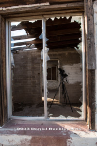 Filming the progression of clouds through a partially destroyed roof.