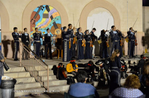 Young mariachi students sit on the steps to get a closer view of Mariachi Aztlan de Pueblo High School